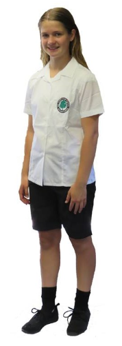 Female student wearing black shorts and school blouse.